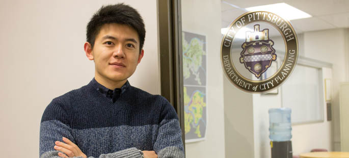 Pictured is Chinese M.B.A. student Bo Ai, social media intern for the Pittsburgh City Department of Planning. | Photo by Lexie Mikula
