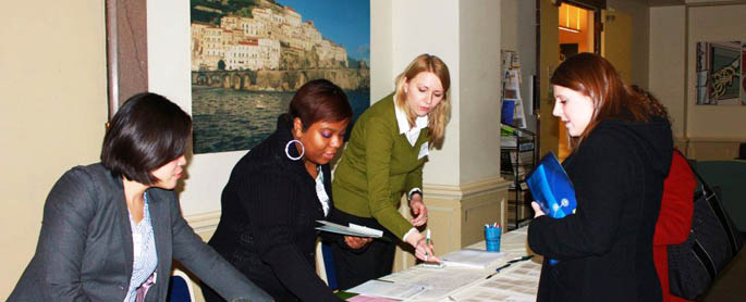 Pictured are members of the Graduate Student Association at a power petworking event registering students.