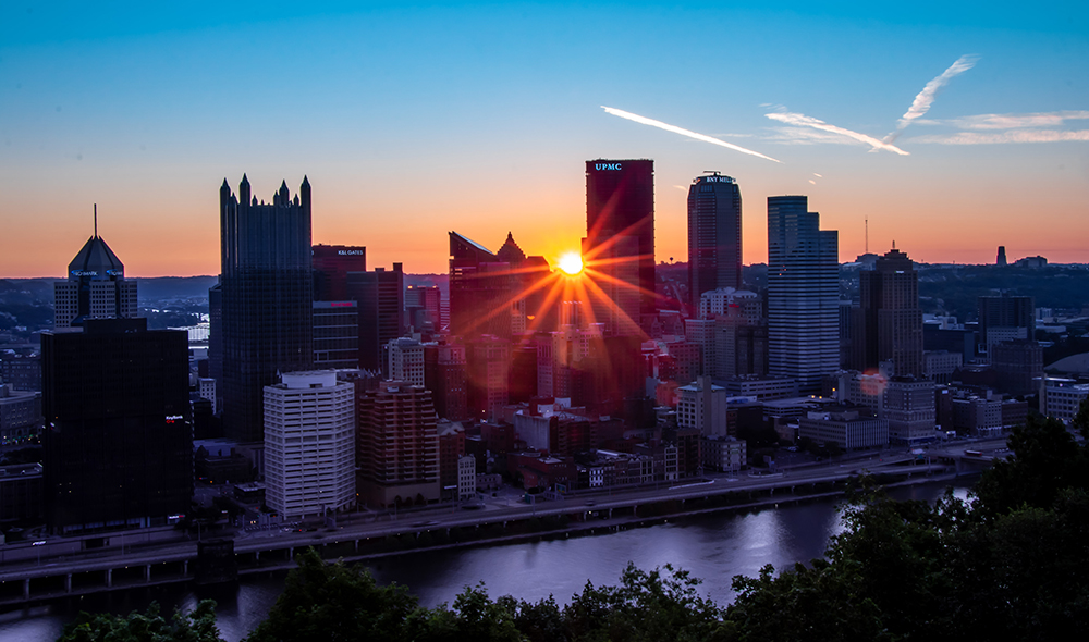 Pictured is Downtown Pittsburgh with the sun shining through. Photo by Mallory Neil.