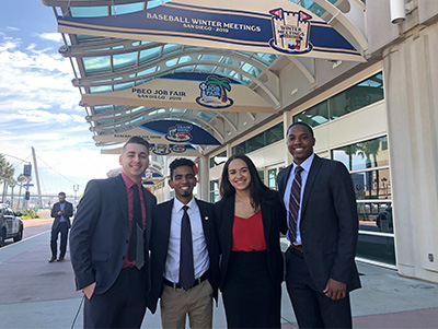 Pictured left to right at the MLB 2019 Winter Meetings are Justin Joyce, Carlos Polanco, Keera Frye and Robelin Bautista.
