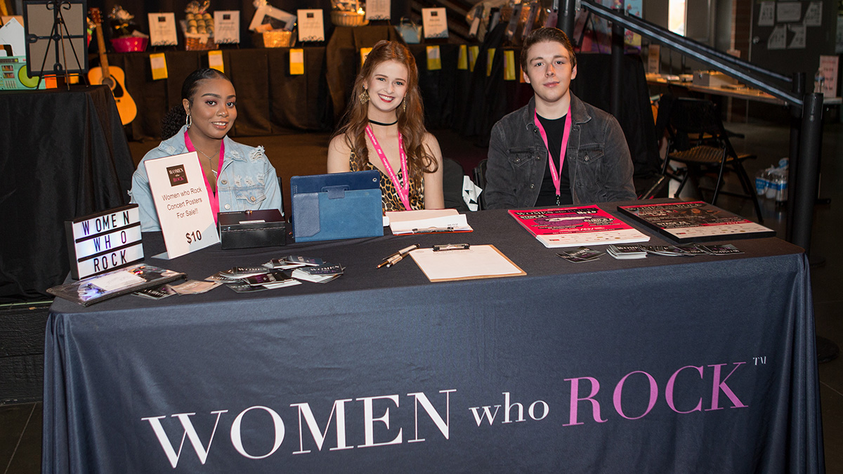 SAEM students at the Women who Rock table. Photo by Kelli Beavers Studio B Portrait.