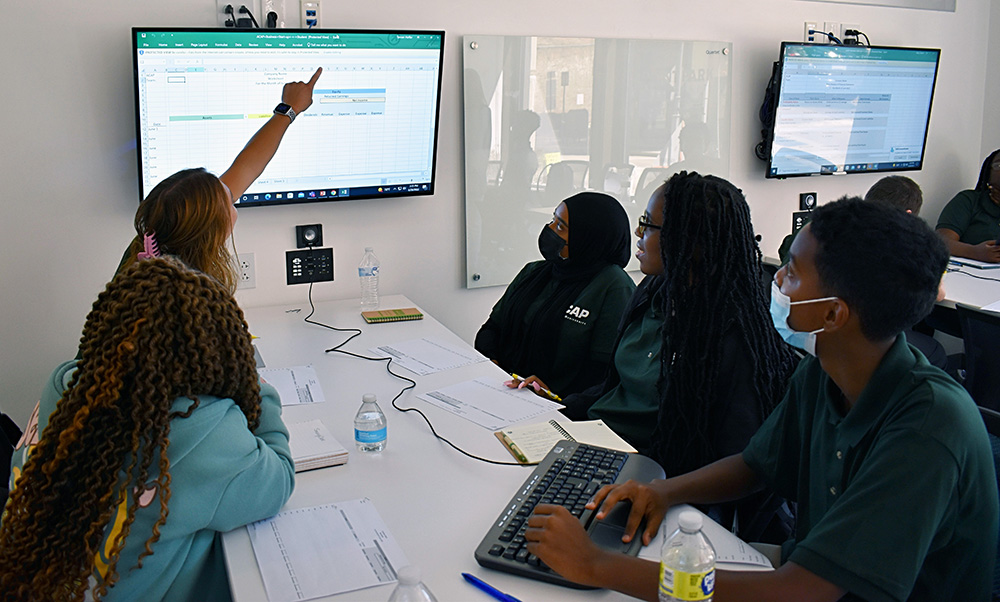 Students work on a group project during ACAP. Photo by Nicole Chynoweth.