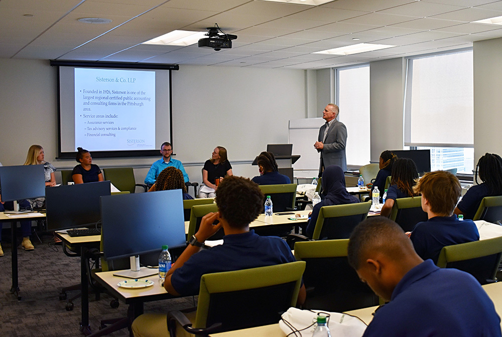 Students in ACAP observe a presentation on accounting at Sisterson & Co. LLP.