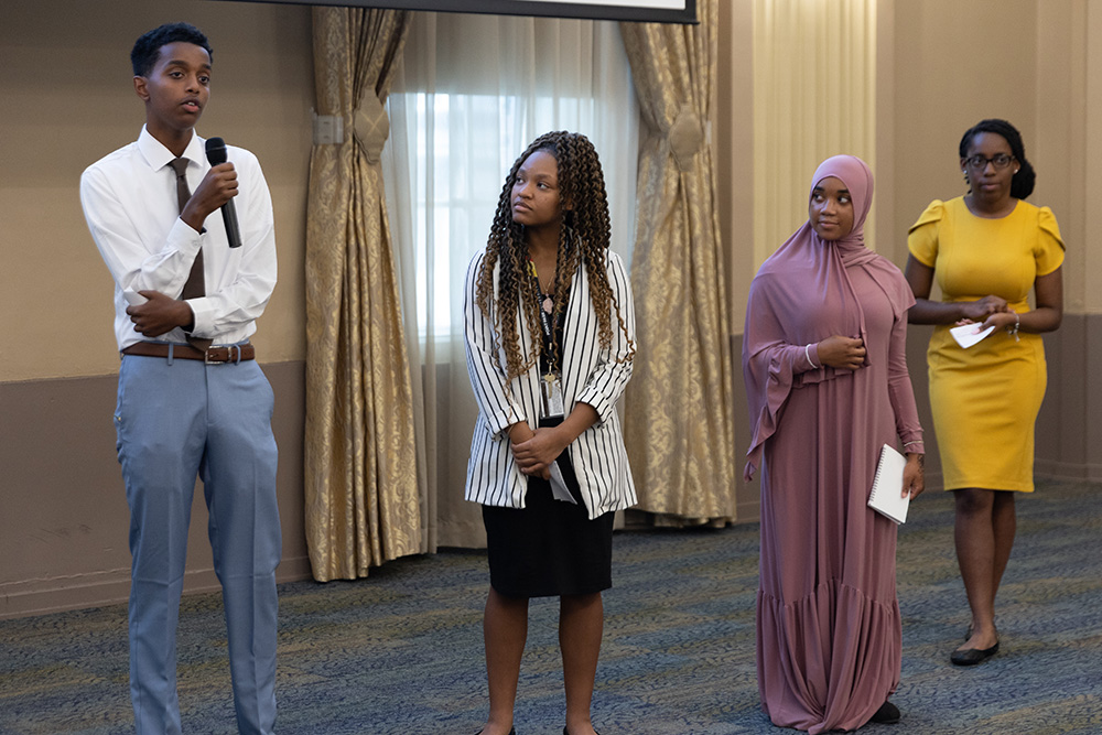 ACAP student Noah Filmon speaks during a presentation about his group's business, Sneaky Clean. Photo by John Altdorfer.