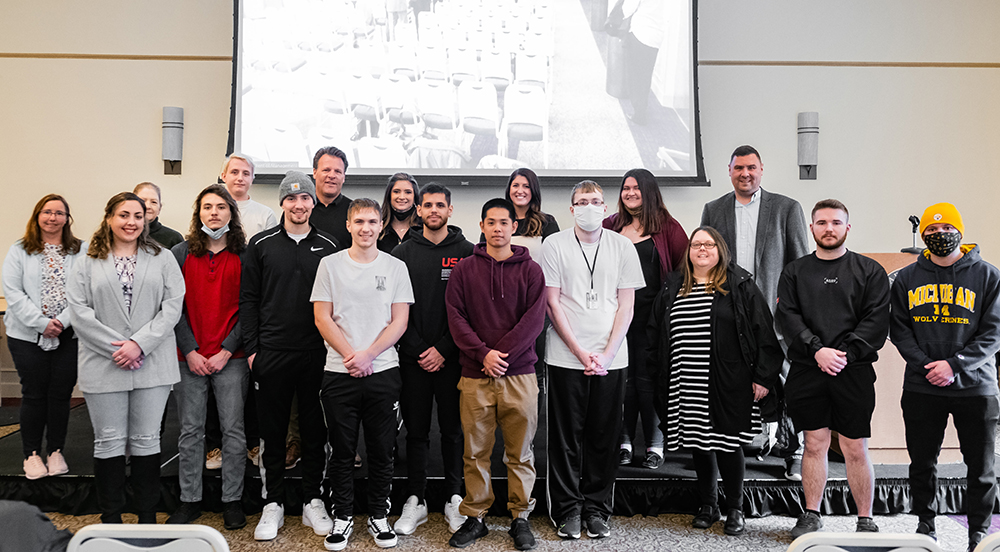 Pictured are Rowland School of Business students and faculty with Dan Cockerell, the former vice president of the Magic Kingdom at Walt Disney World. Submitted photo.