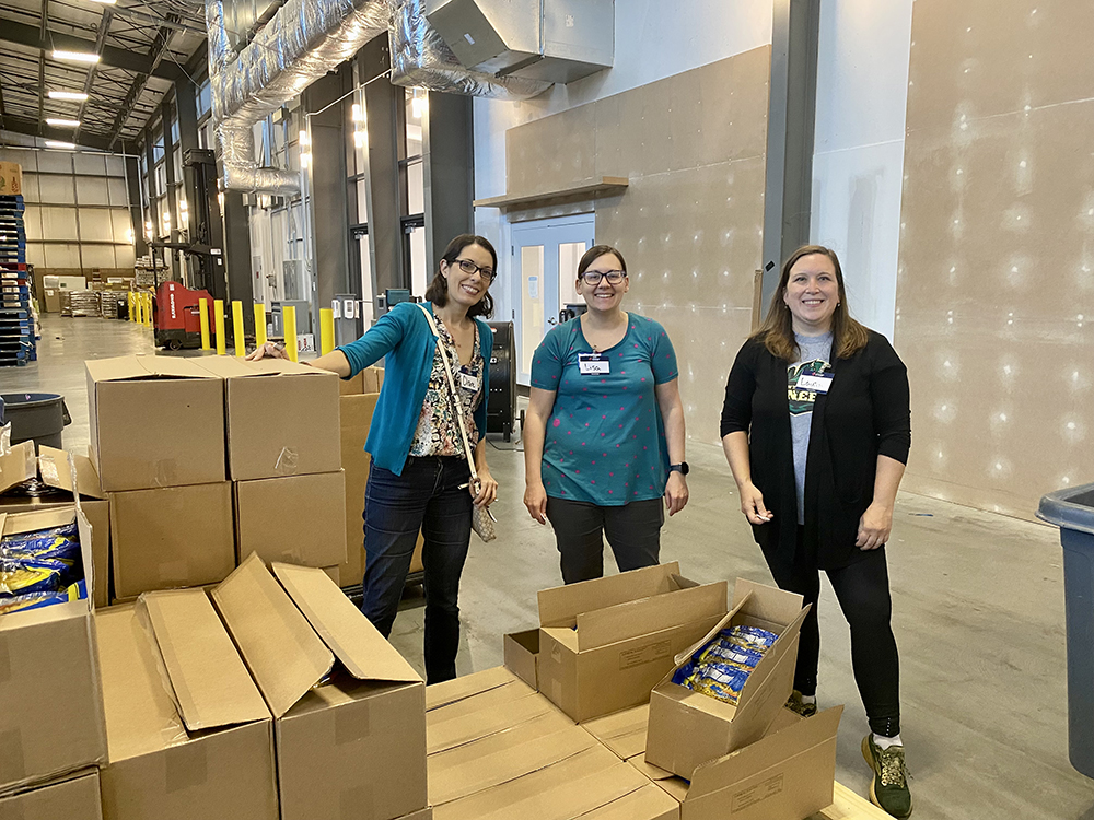 Pictured are Ph.D. students volunteering at the Greater Pittsburgh Community Food Bank.