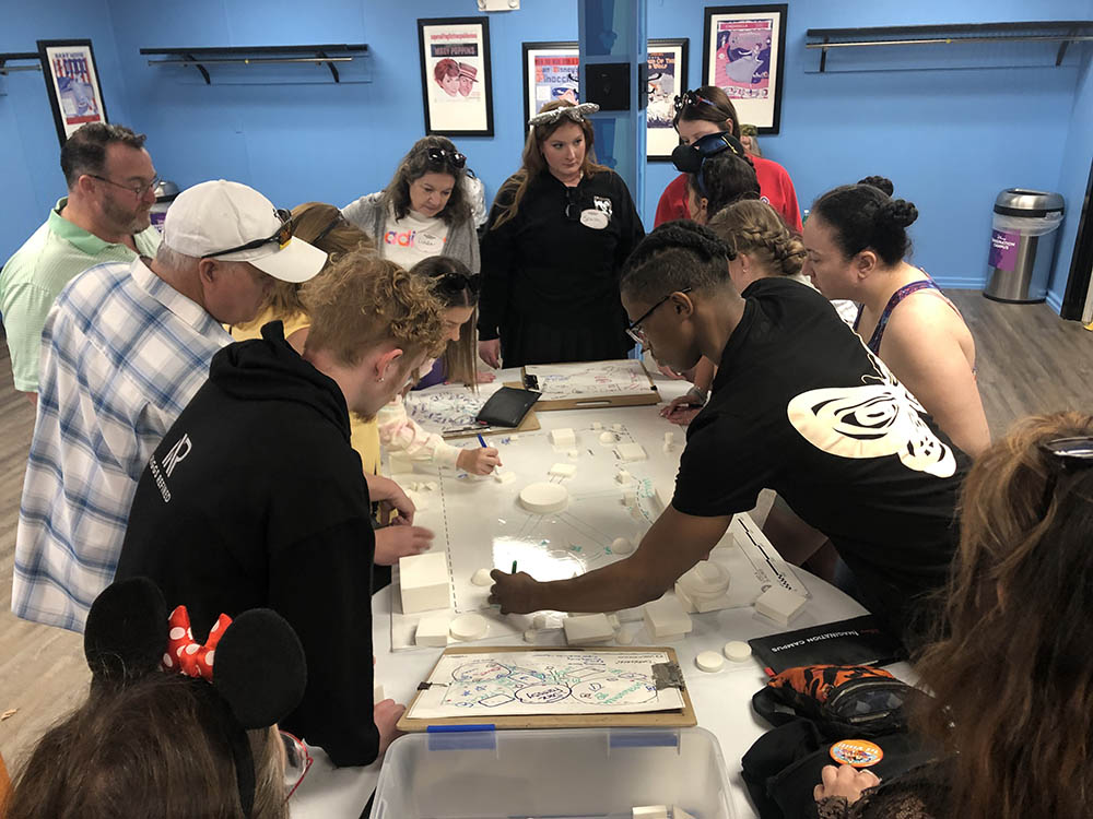 Pictured are students participating in a theme park design workshop. Submitted photo.