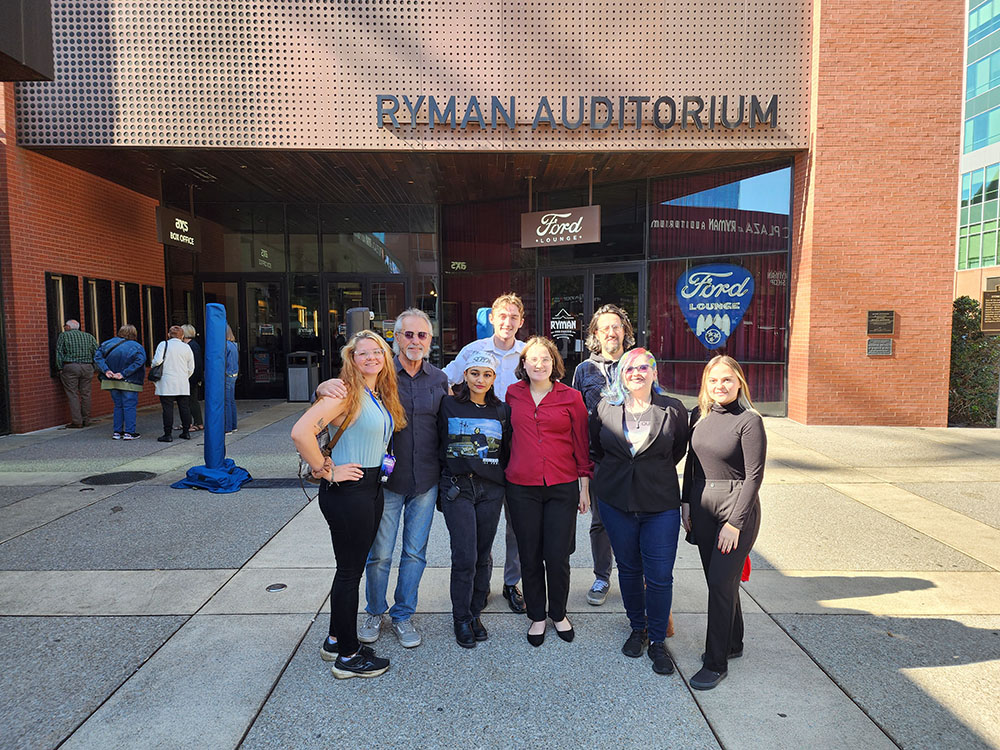Pictured left to right, front row, are Arianna Sanker, Ed Traversari, Sandamini Sinley, Emily Lutz, Rhyan Anderson and Rebecca Schnupp. Pictured left to right, back row, are Ryan Dawson and Cory Traversari. The group is pictured outside of Ryman Auditorium. Photo courtesy of Arianna Sanker.