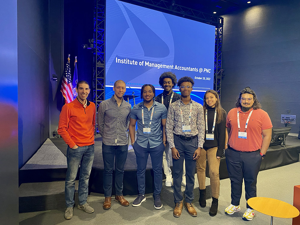 Pictured are Nick Trusch and Austin Glass of PNC Financial Services Group with students Edwin De La Rosa, Terry Craig Jr., Matthew Harris, Natalie Diaz-Molina and Shivansh Waleacha. Photo by Nicole Chynoweth.