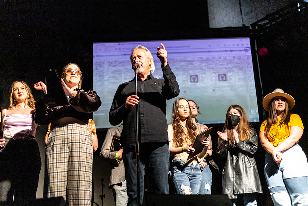 Pictured is SAEM Professor Ed Traversari speaking at the Pioneer Records Release Show.