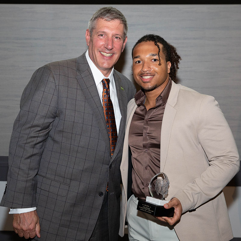 Pictured is President Chris W. Brussalis and Edwin De La Rosa. Photo by John Altdorfer.