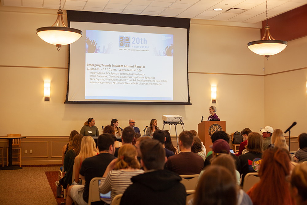 Pictured are students attending an alumni panel moderated by Professor Paige Beal. Photo by Natalie Caine.