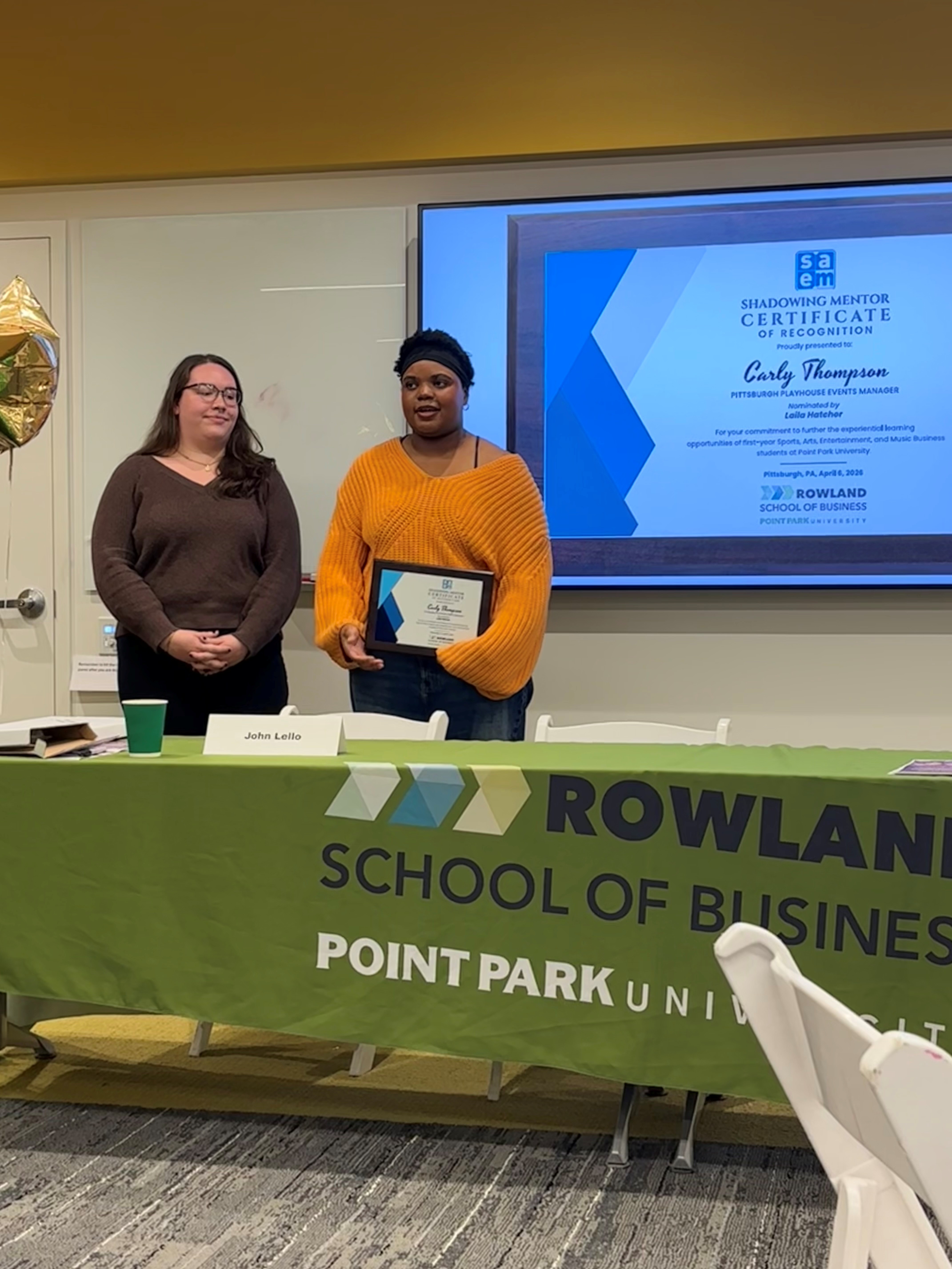 Carly Thompson poses with Laila Hatcher while presenting an award for the shadowing experience. Photo submitted.