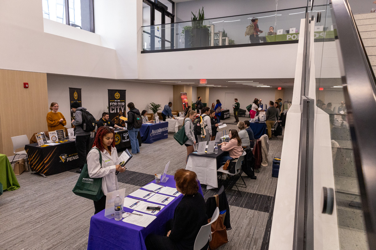 Students visit tables at SAEM Emerging Trends 2026.