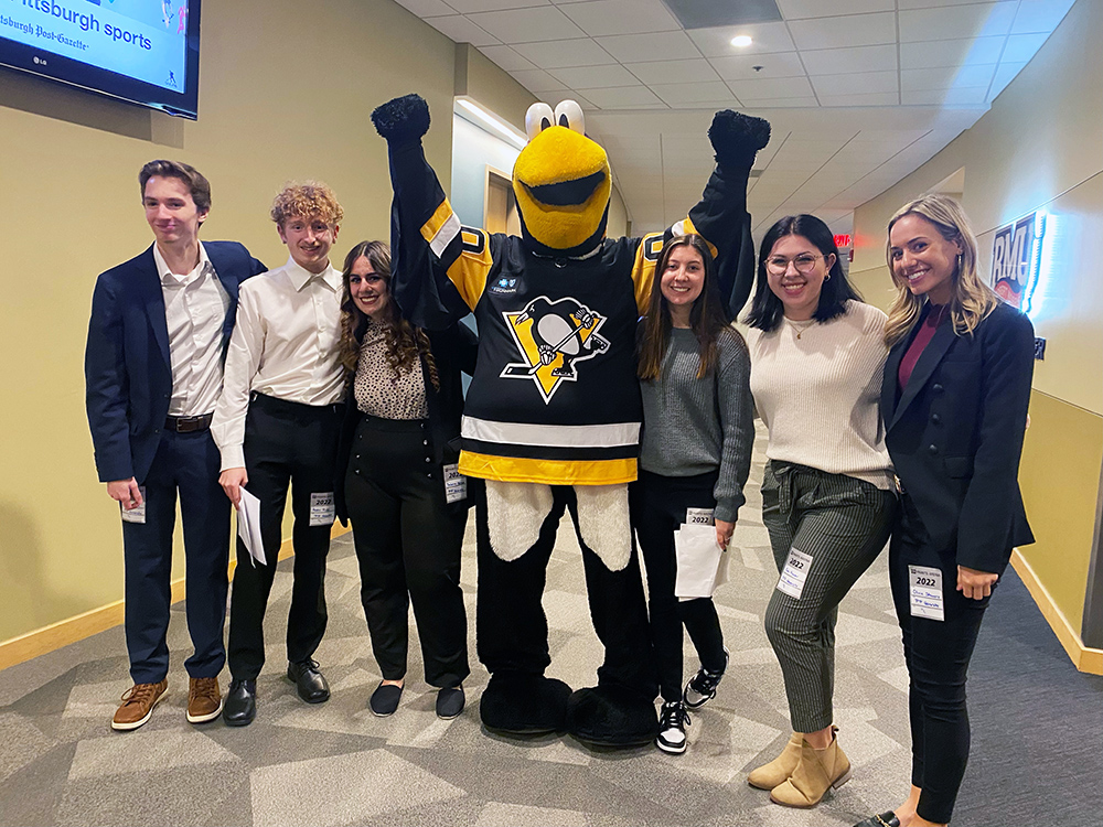 Pictured are Point Park University students with Iceburgh, the Pittsburgh Penguins mascot. Submitted photo.