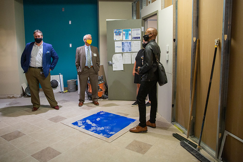 Visitors tour the under-construction Michael P. Pitterich Sales and Innovation Center. Photos by  John Altdorfer.