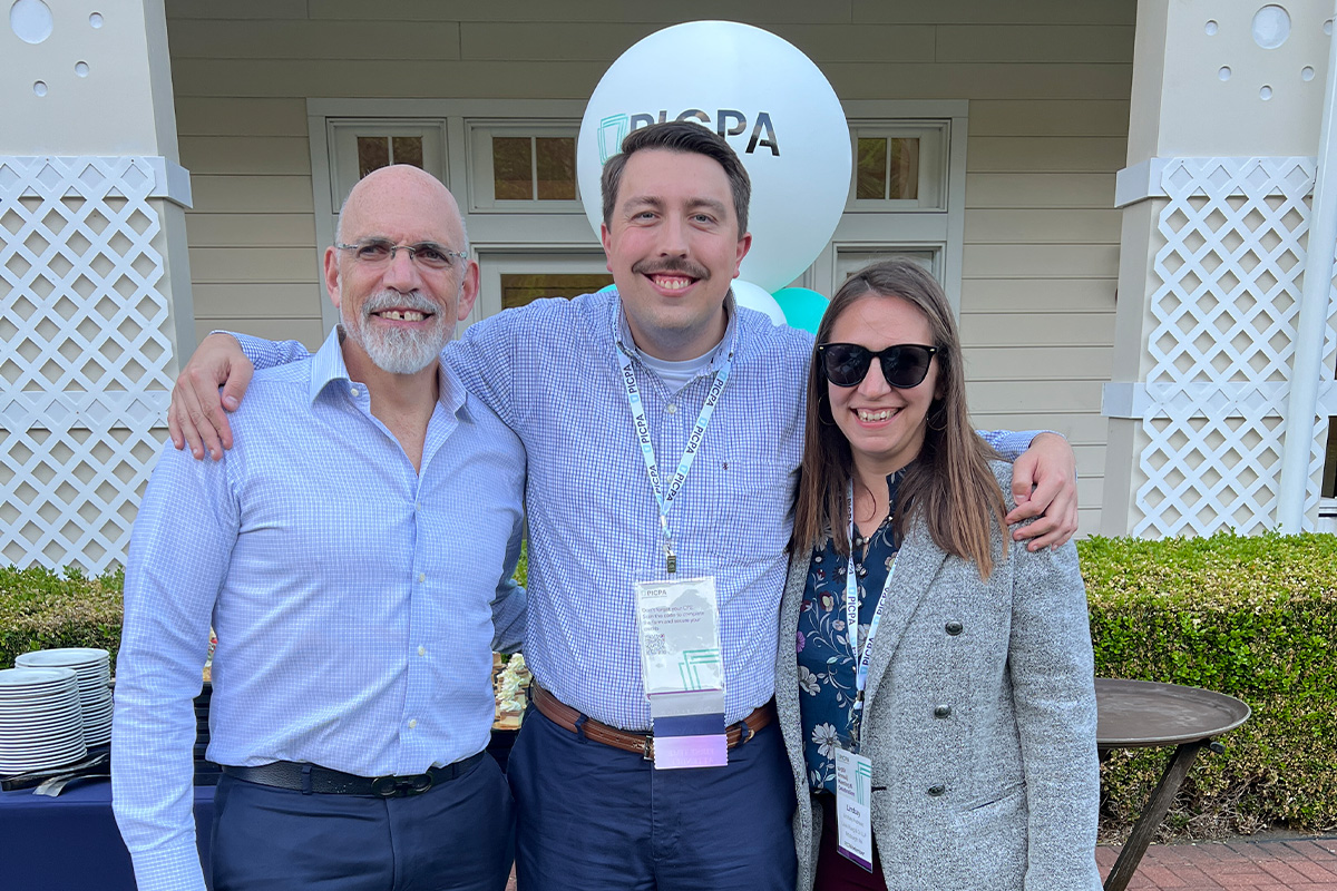 Steven Fisher (center) poses with Louis Plung and Company's Managing Partner Lindsay Andrews and Tax Partner Louis Plung at the PICPA 2026 Convention in Bedford, Pa. Photo submitted.