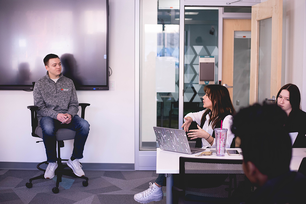 Pictured is Zac Seymour and Point Park students interacting during a class. Photo by Madi Fisher.