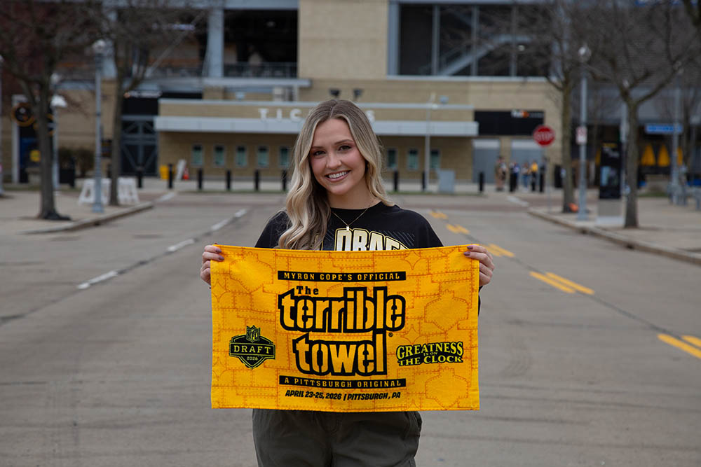 Pictured is Payton Comunale holding a terrible towel.