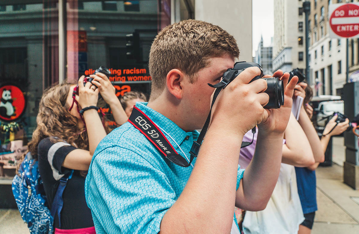 Students taking photos in Downtown Pittsburgh. Photo | Emma Federkeil