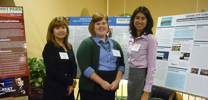 School of Communication graduates students Ligaya Scaff and Tinamaria Colaizzi at the panel session during the Pennsylvania Communication Association conference.