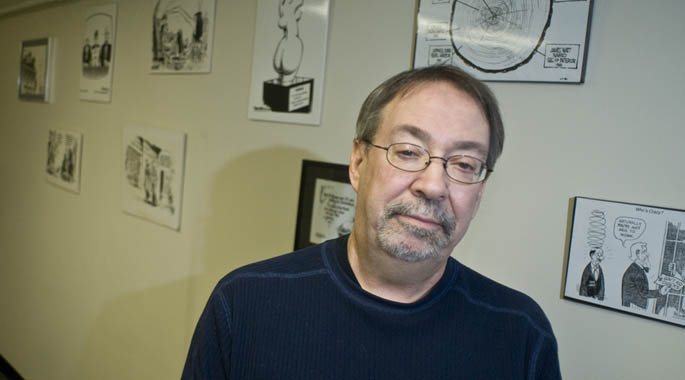 Assistant Professor Steven M. Hallock in his office. | Photo by Christopher Rolinson