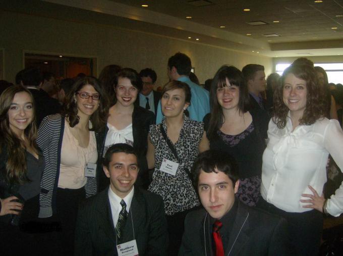 Group photo of 8 students at National Broadcasting Society event 3-12