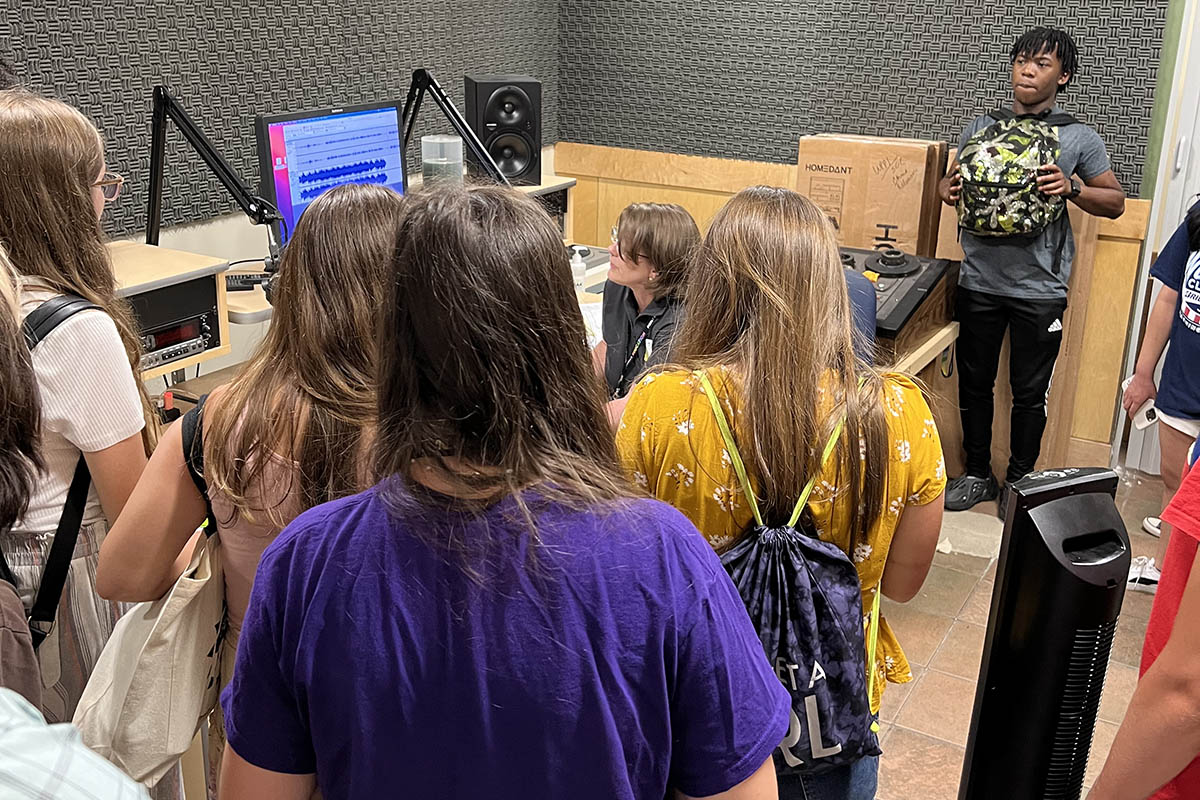 Freelance radio Host Tracey Belak-Morgan offers tips on audio recording in Point Park's radio studio. 