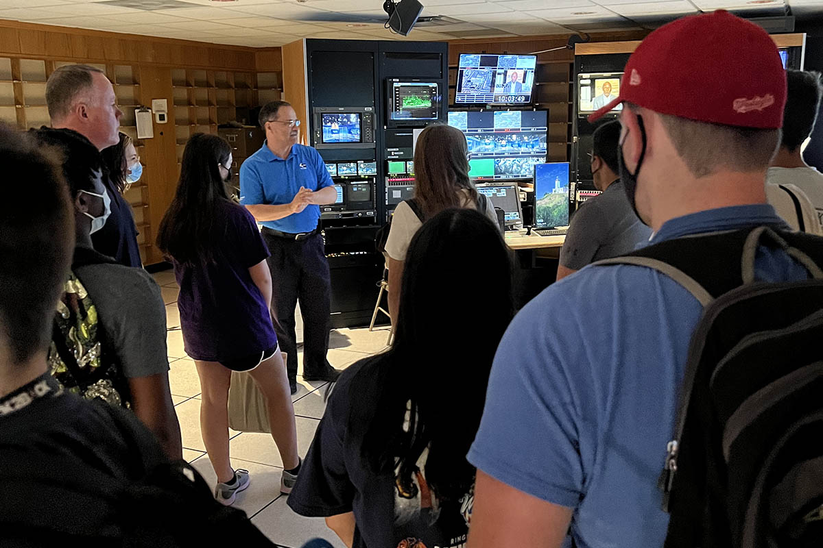 WTAE General Manager Chuck Wolfertz and Chief Engineer Paul Nowakowski show students the feeds and functions in the control room.