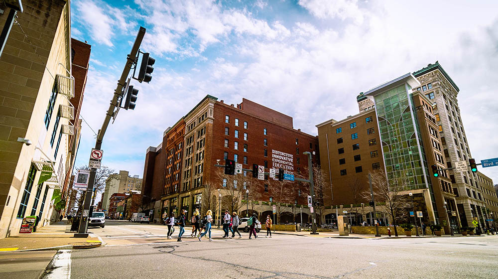 Students crossing the Boulevard of the Allies and Wood Street. Photo | Nathaniel Holzer