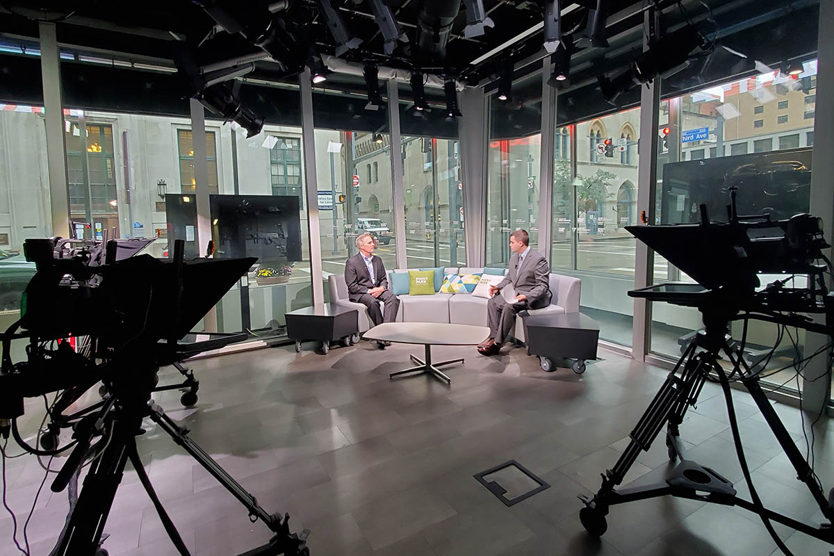 Student Colton DeBiase interviews Point Park University President Paul Hennigan as part of a segment for election night coverage.  Photo | Stacey Federoff