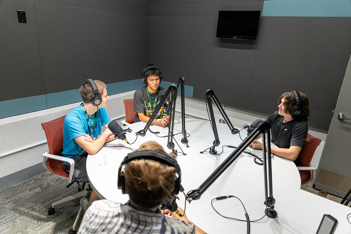 Students host a podcast in the Center for Media Innovation. Photo | Paul Koontz