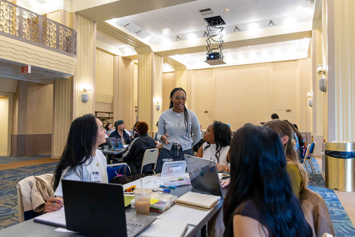 Charm La'Donna interacts with students in the workshop.