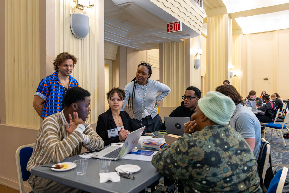 Charm La'Donna interacts with students in the workshop.