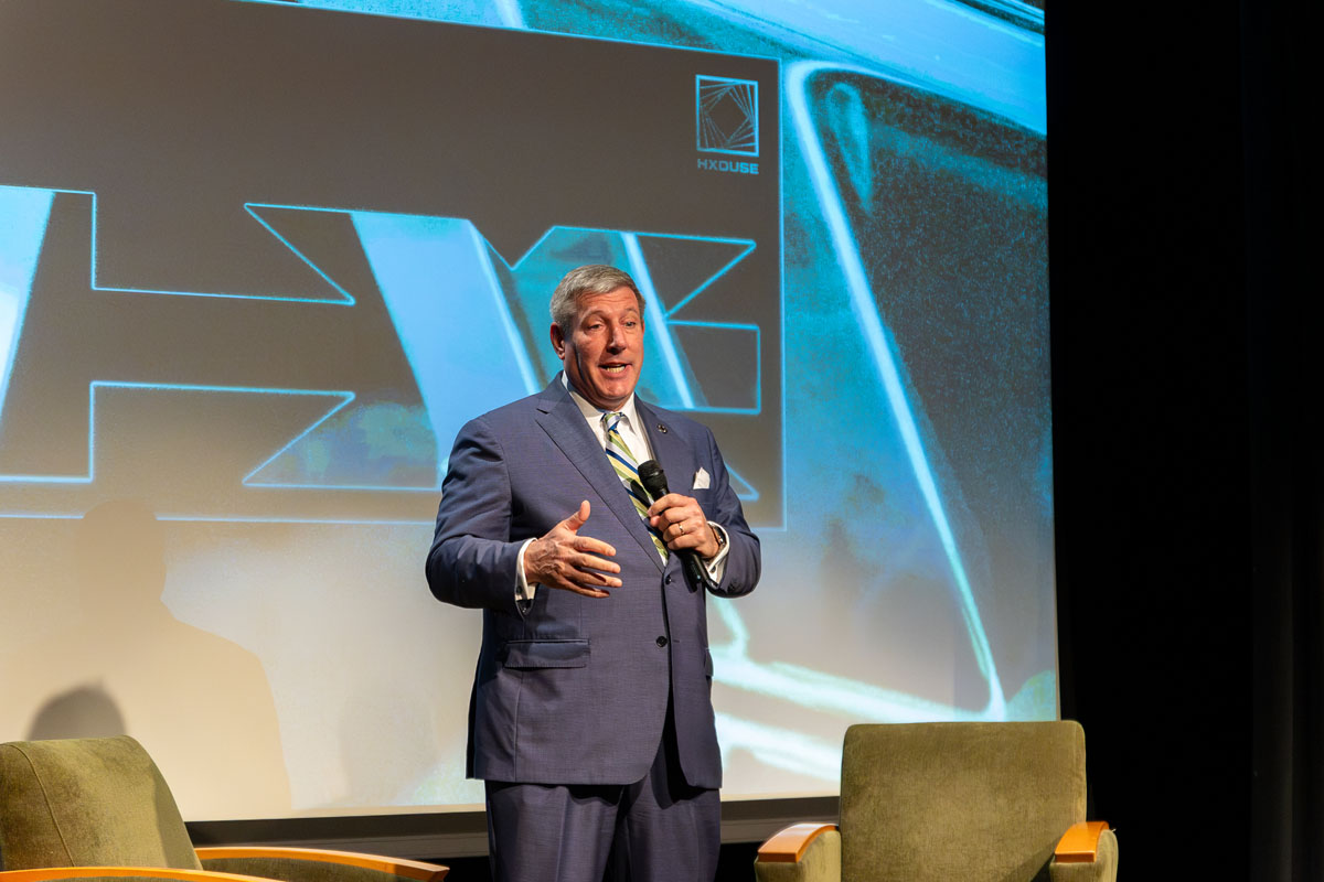 Chris Brussalis on the stage at the GRW theatre.