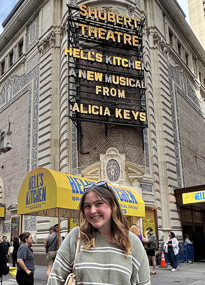 Pictured is Caroline Inches outside of the Schubert Theatre.