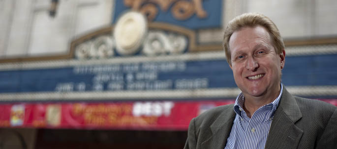 Steve Cuden, new assistant professor of screenwriting and co-creator of Jekyll & Hyde, stands in front of the Benedum Center, which is staging a production of the musical in June. | Photo by Chris Rolinson