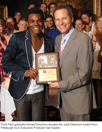 Dance alumnus Ahmad Simmons accepts the Julia Deberson Award from Pittsburgh CLO Executive Producer Van Kaplan. | Photo courtesy of Pittsburgh CLO