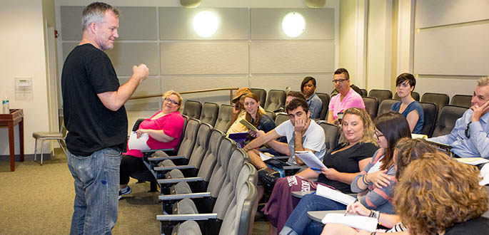Gordy Hoffman leads a seminar during the M.F.A. low-residency program in August 2014. Photo | John Altdorfer