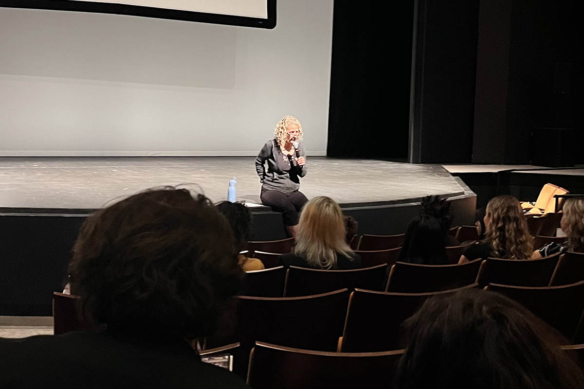 Kathryn Spitz Cohan, founder of Film Pittsburgh, speaks to students in the PNC Theatre. Photo | Chloe Humway '28