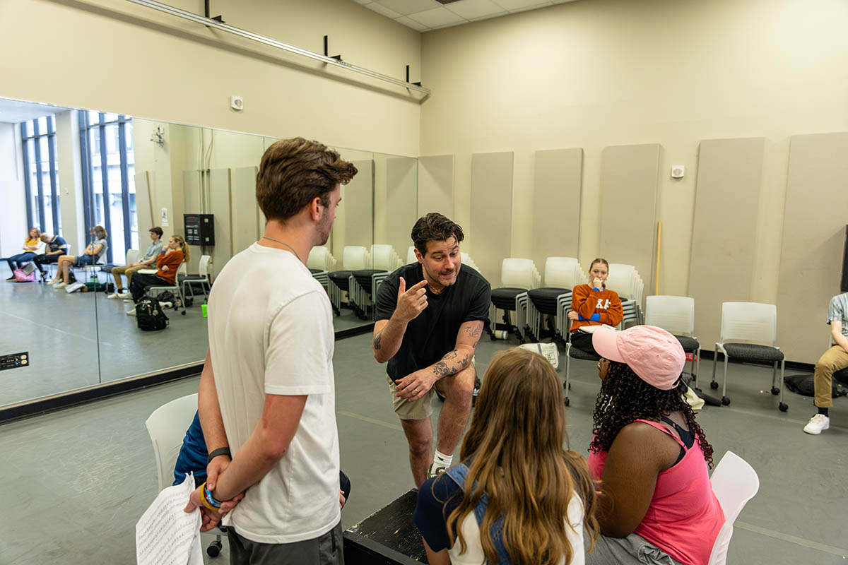 Michael Campayno works with students during an acting class. Photo | Paul Koontz