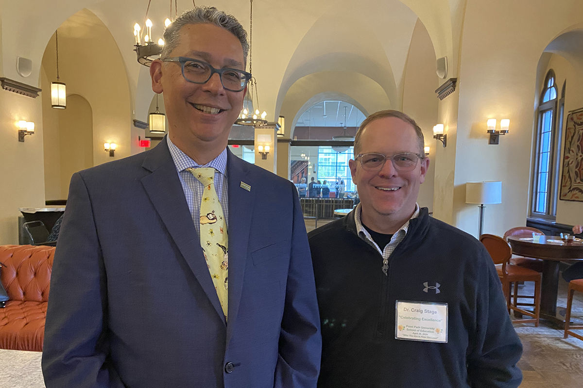 Pictured are Michael Soto, Ph.D., provost and senior vice president of Academic Affairs, and Craig Stage, Ed.D. Photo by Nadia Jones.
