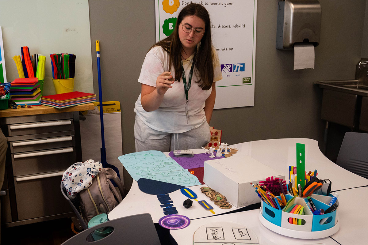 A student describes how her board game works.
