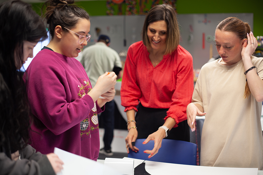 Ava Cook, left, works on a project in the Matt's Makerspace Lab with Dr. Kamryn York. Photo by Natalie Caine.