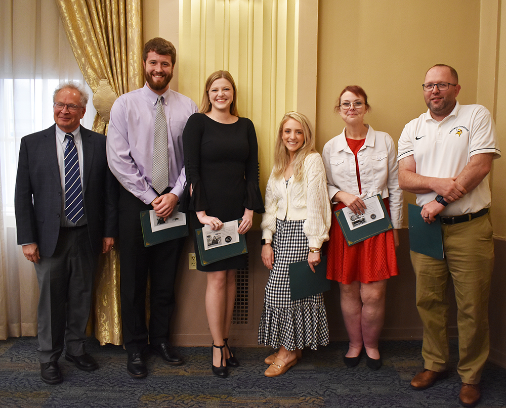 Pictured are Professor Richard Gutkind, far left, and graduate secondary education students. 