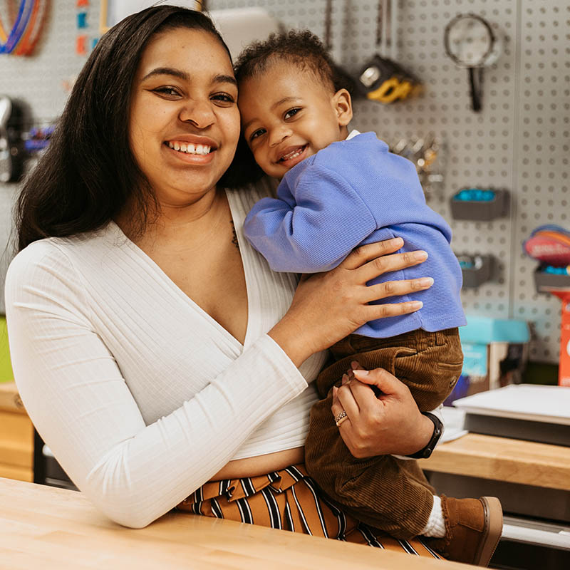 Pictured is Cydney Haines and her son. Photo by Ethan Stoner.