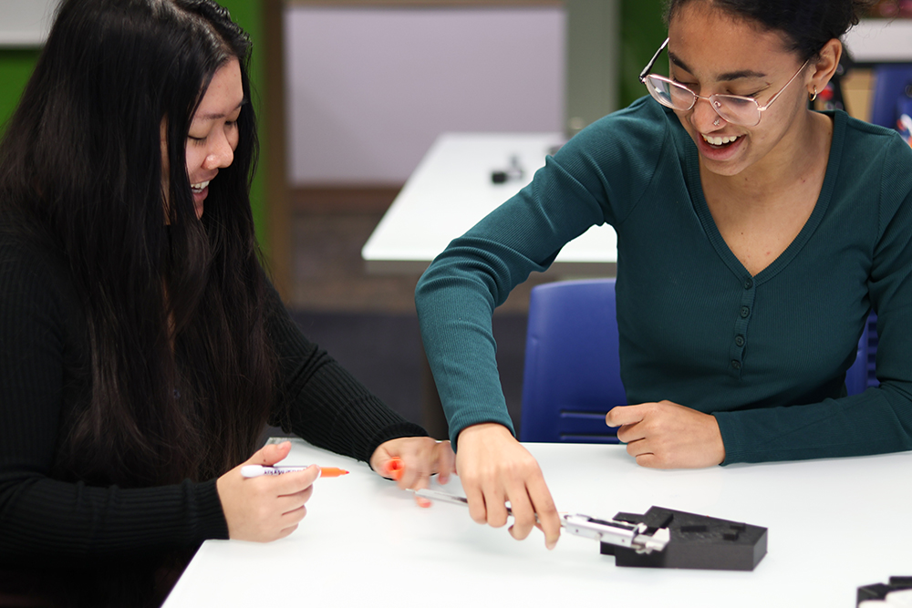 Pictured are Lucia Melocchi and Kiyara Sawyers working together in a Matt's Maker Space Lab