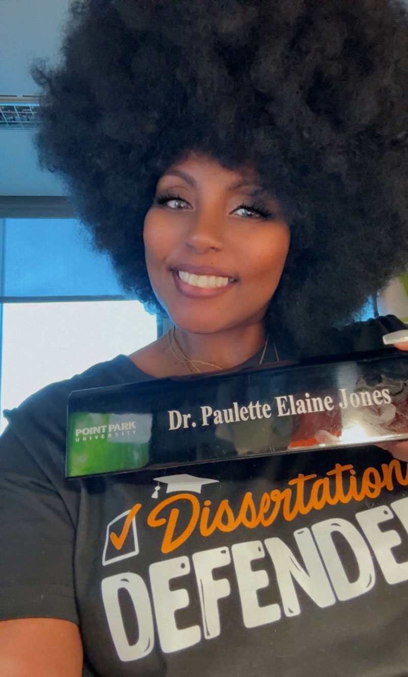 Paulette Jones poses with her name plate.