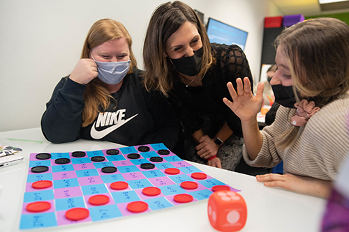 Pictured is Kamryn York, center, as she teaches two students in the Matt's Maker Space Lab at Point Park. Photo by Randall Coleman.