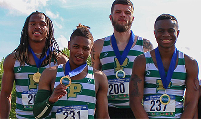 Pictured is Theo Washington with Point Park's 4x100 Relay team at the RSC meet April 29, 2017.